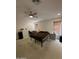 Comfortable bedroom with ceiling fan, carpeted floors and ample natural light at 300 S 151St Ave, Goodyear, AZ 85338