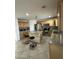 Kitchen with wood cabinets, stainless steel appliances, and an island at 300 S 151St Ave, Goodyear, AZ 85338