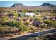 Picturesque aerial view of a home in a desert community, with mountain views at 36701 N Porta Nuova Rd, Scottsdale, AZ 85262