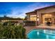 Backyard oasis with pool, spa, and outdoor bar, perfect for entertaining at 36701 N Porta Nuova Rd, Scottsdale, AZ 85262
