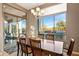 Breakfast area with sliding glass doors leading to the backyard patio at 36701 N Porta Nuova Rd, Scottsdale, AZ 85262