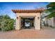 Golf cart garage with golf cart, bicycles, and brick pavers at 36701 N Porta Nuova Rd, Scottsdale, AZ 85262