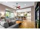 Open-concept living room with a view into the kitchen and dining area at 36701 N Porta Nuova Rd, Scottsdale, AZ 85262