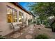 Charming patio area with seating nestled beside desert landscaping at 36701 N Porta Nuova Rd, Scottsdale, AZ 85262