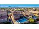 Aerial view of a house with a refreshing blue pool and spacious backyard at 36909 N Coronado Ln, San Tan Valley, AZ 85140