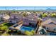Aerial view showcasing a house with a private pool and backyard at 36909 N Coronado Ln, San Tan Valley, AZ 85140