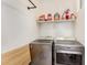 Laundry room with washer, dryer, and shelving at 36909 N Coronado Ln, San Tan Valley, AZ 85140