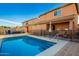 Private backyard pool with patio furniture at 36909 N Coronado Ln, San Tan Valley, AZ 85140