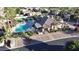 Aerial view of the community clubhouse, pool, and surrounding area at 6202 E Mckellips Rd # 66, Mesa, AZ 85215