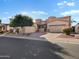 Beautiful home with a paver driveway, three-car garage, and desert landscaping at 6202 E Mckellips Rd # 66, Mesa, AZ 85215