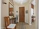 Welcoming entryway with wood door and tile flooring at 6202 E Mckellips Rd # 66, Mesa, AZ 85215