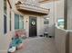 Inviting courtyard entryway with decorative metal door at 6202 E Mckellips Rd # 66, Mesa, AZ 85215