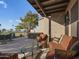 Relaxing patio area with a hot tub, comfortable seating, and golf course views at 6202 E Mckellips Rd # 66, Mesa, AZ 85215