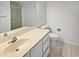 Clean bathroom with light tile flooring and neutral-toned vanity at 11444 N 28Th Dr # 13, Phoenix, AZ 85029
