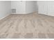 Carpeted bedroom with white walls and closet doors at 11444 N 28Th Dr # 13, Phoenix, AZ 85029