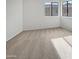 Bright bedroom with large windows and plush carpeting at 11444 N 28Th Dr # 13, Phoenix, AZ 85029
