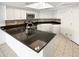 Updated kitchen with white cabinets, dark granite countertops, and stainless steel appliances at 11444 N 28Th Dr # 13, Phoenix, AZ 85029