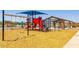 Bright playground with swings, slides, climbing equipment, and shade area at 12639 W Parkway Ln, Avondale, AZ 85323