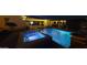 Backyard at night with a pool, spa, and string lights at 14959 S 184Th Ave, Goodyear, AZ 85338