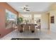 Dining room with a view into the kitchen and Gathering room beyond at 1613 W Ainsworth Dr, Anthem, AZ 85086