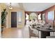 Open living and dining area with stylish furniture and elegant decor at 1613 W Ainsworth Dr, Anthem, AZ 85086