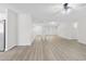 Bright living room with hardwood floors and neutral walls at 1727 N Summer Cir, Mesa, AZ 85203