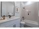 Modern bathroom with tiled shower and single vanity at 1833 W Caramel Ct, Queen Creek, AZ 85144