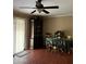 Dining room with dark wood furniture and green tablecloth at 3630 N 86Th Ave, Phoenix, AZ 85037