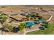 Aerial view of a community playground with shade structures at 38085 W Excussare Way, Maricopa, AZ 85138