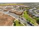 A community park surrounded by several homes as seen from an aerial view at 38085 W Excussare Way, Maricopa, AZ 85138