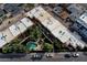 An aerial view of the community, showcasing the pool and surrounding buildings at 4601 N 73Rd St # 6, Scottsdale, AZ 85251