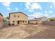 Spacious backyard with gravel and a patio at 5814 E Sunrise Cir, Florence, AZ 85132