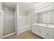 Main bathroom with double vanity, shower, and tub at 5814 E Sunrise Cir, Florence, AZ 85132