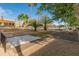 Landscaped backyard with bocce ball court and fire pit area at 8325 W La Caille --, Peoria, AZ 85383