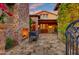 Outdoor patio with fireplace and wrought iron gate at 8330 E Sunset View Dr, Gold Canyon, AZ 85118