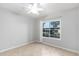 Empty bedroom with tiled floor, ceiling fan, and window at 9451 E Becker Ln # 1026, Scottsdale, AZ 85260