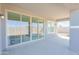 Covered back patio with sliding glass doors and a view of the backyard at 1365 E Avenida Ellena Ln, Casa Grande, AZ 85122
