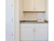 Close-up of the coffee bar area with white shaker cabinets and decor at 1365 E Avenida Ellena Ln, Casa Grande, AZ 85122