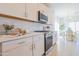 Modern kitchen featuring stainless steel appliances and white countertops at 1365 E Avenida Ellena Ln, Casa Grande, AZ 85122