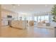 Modern kitchen with island and open living area at 1365 E Avenida Ellena Ln, Casa Grande, AZ 85122