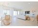 Spacious living room with sliding glass doors and modern decor at 1365 E Avenida Ellena Ln, Casa Grande, AZ 85122