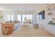 Living room with sliding glass doors leading to the backyard at 1365 E Avenida Ellena Ln, Casa Grande, AZ 85122