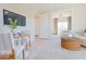 Open living area with dining table and bedroom access at 1365 E Avenida Ellena Ln, Casa Grande, AZ 85122
