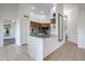 Kitchen with stainless steel appliances, marble island, and wood cabinets at 1714 E Behrend Dr, Phoenix, AZ 85024