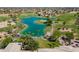 Community overview featuring a golf course and lake at 3188 N 167Th Dr, Goodyear, AZ 85395