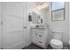 Bathroom with toilet, vanity, and window at 3188 N 167Th Dr, Goodyear, AZ 85395