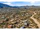 Aerial view of house with expansive mountain views at 37615 N Tranquil Trl, Carefree, AZ 85377