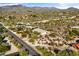 Aerial view of house with desert landscape and mountains at 37615 N Tranquil Trl, Carefree, AZ 85377