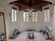 Well-equipped home gym featuring cardio and strength training equipment at 5057 E Sky Desert Ln, Paradise Valley, AZ 85253