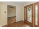 View of the entryway with tile flooring, a ceiling fan, and a decorative glass door at 5334 N 20Th St, Phoenix, AZ 85016